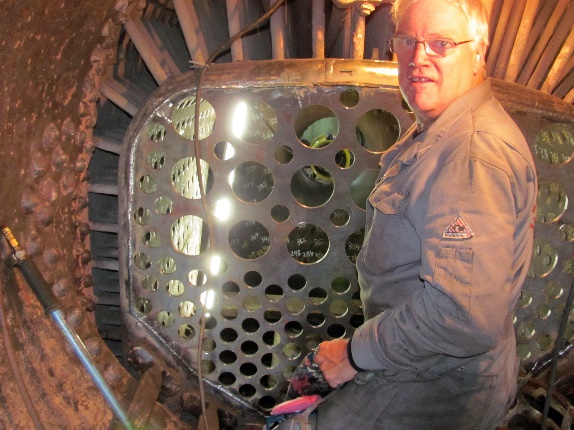 Brother Brent Graham, in the smoke box,  welded the new tube sheets in place.