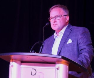 Lodge 203 Business Manager Jerry Flaherty welcomes members & guest to the big celebration