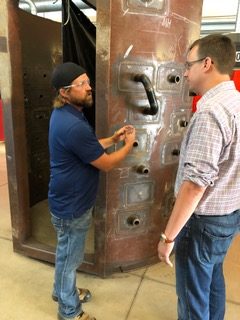 Boilermaker Welding Instructor Jared Cook explains fitting and welding techniques with Monte McNaughton, Ontario’s Minister of Labour